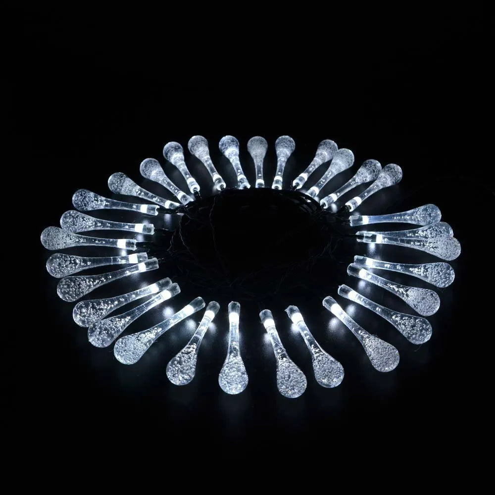 Solar-powered outdoor LED string lights with water drop pendants on 6.5 metre cable