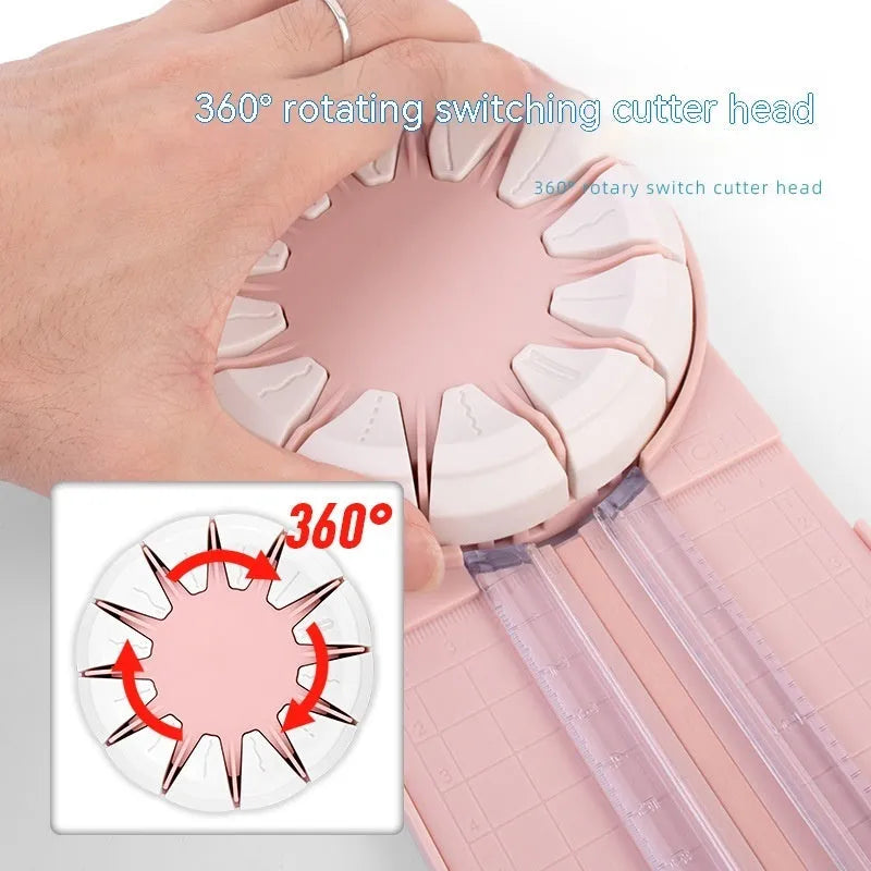 Pink plastic desktop paper cutting machine with a rotary blade for 12 different decorative edge patterns.