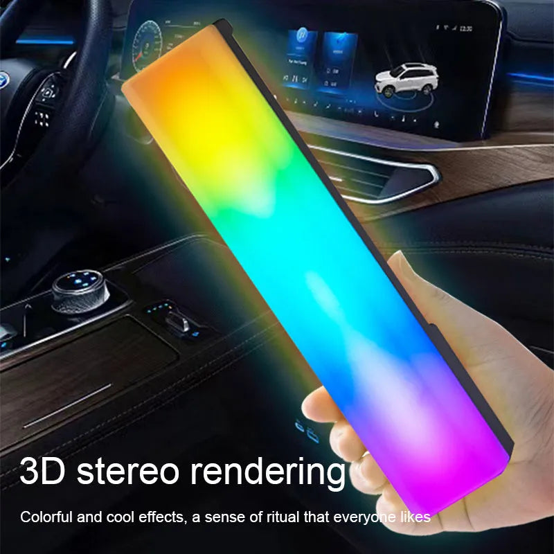 A tall, colourful RGB table lamp with a white or black shell reacting to sound on a desk.