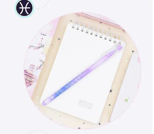 Box of 12 constellation-themed quick-drying gel pens with plastic bodies and coloured caps