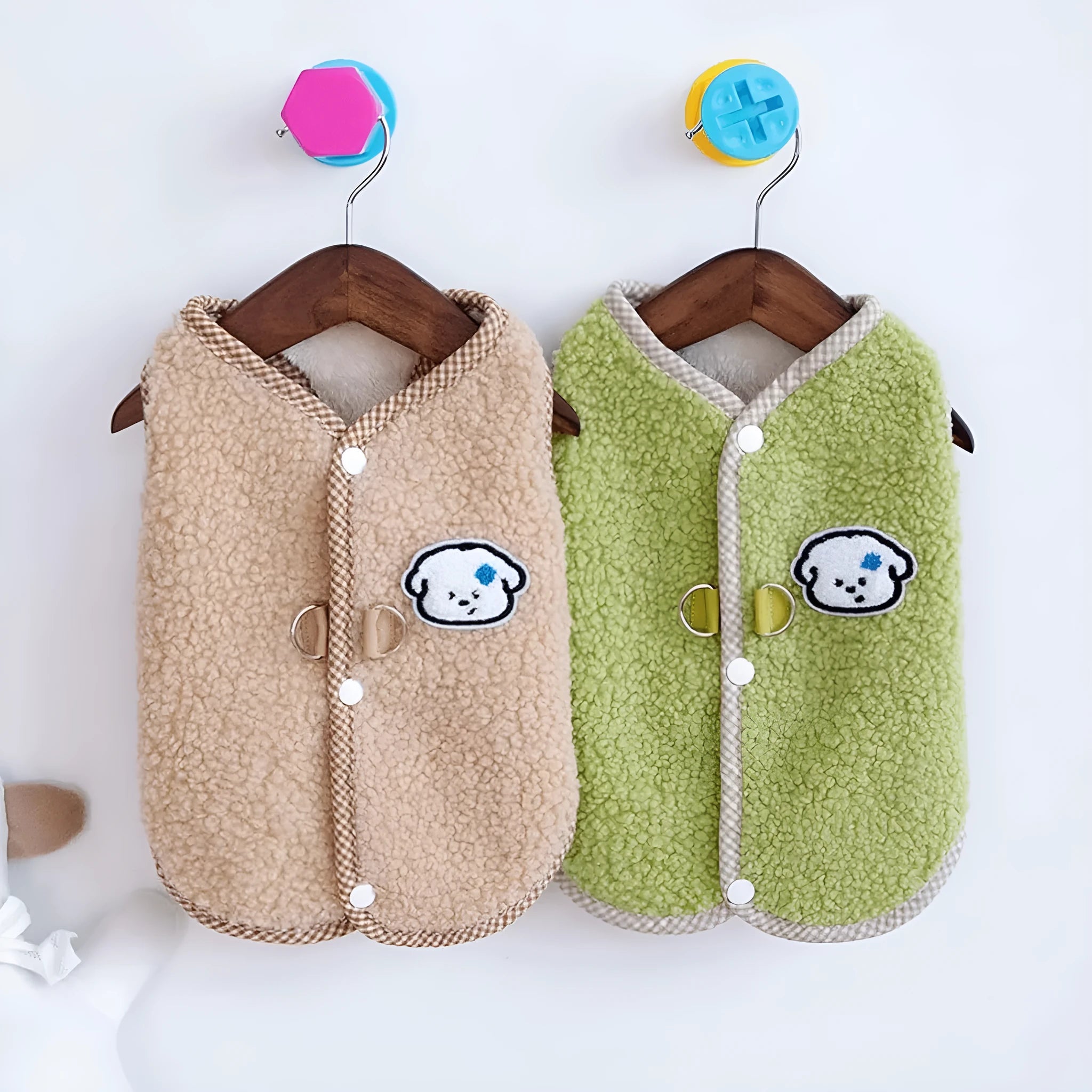 Green thickened coral fleece dog vest with a metal leash ring on a small dog.