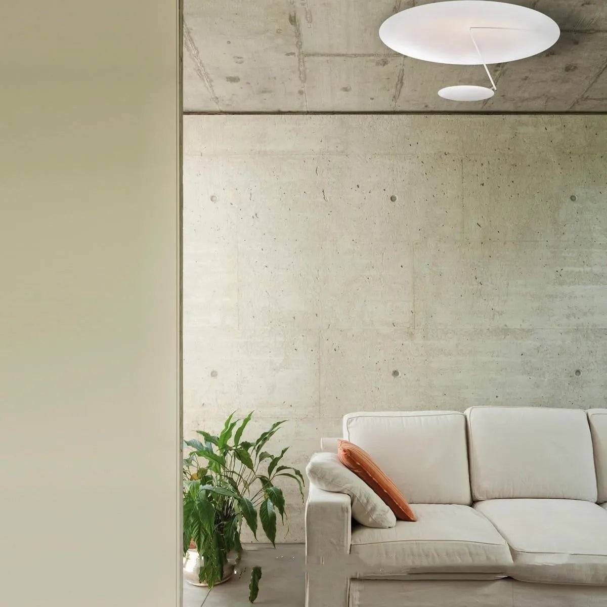 50cm round white iron ceiling lamp with integrated warm LED lights mounted on a white ceiling.