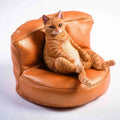 Small lazy cat model ornament with sofa on a car dashboard, approximately 7.5cm high.