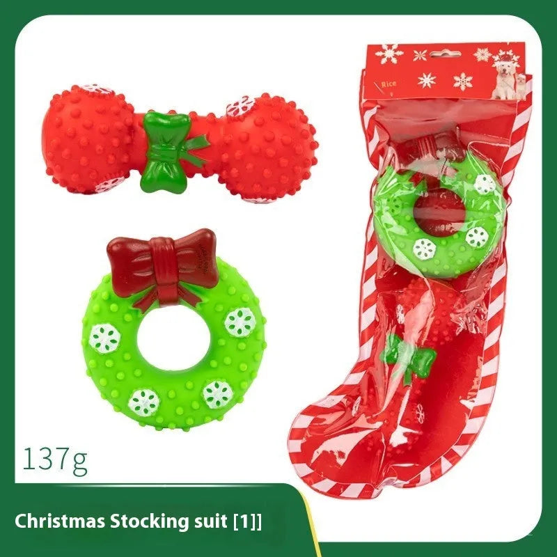 Seven Christmas vinyl dog toy gift sets with bite-resistant designs including Santa heads and holiday shapes