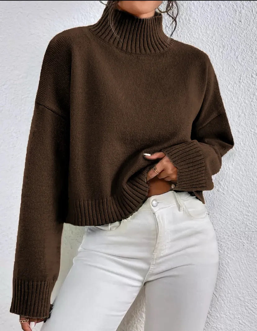 Loose versatile basic women's pullover in gray, showing thread texture and relaxed fit