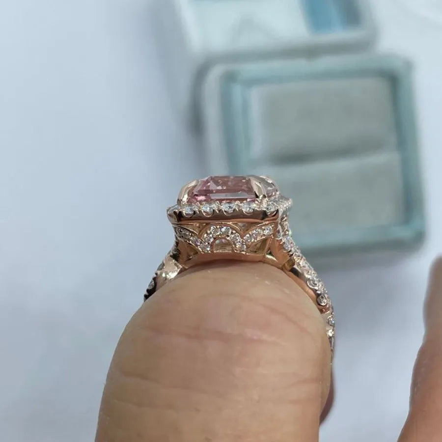 Women's rose gold electroplated alloy geometric ring shown in seven available sizes