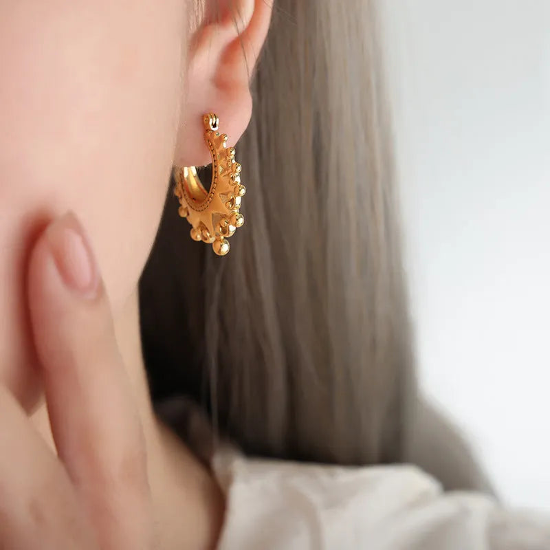Titanium steel ball-shaped safety lock earrings in gold or steel, U-shaped women's earring pair