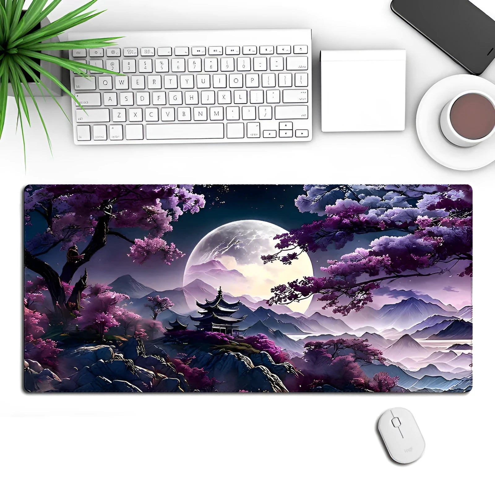 Large black gaming mouse pad with precision lock edge on desk with keyboard
