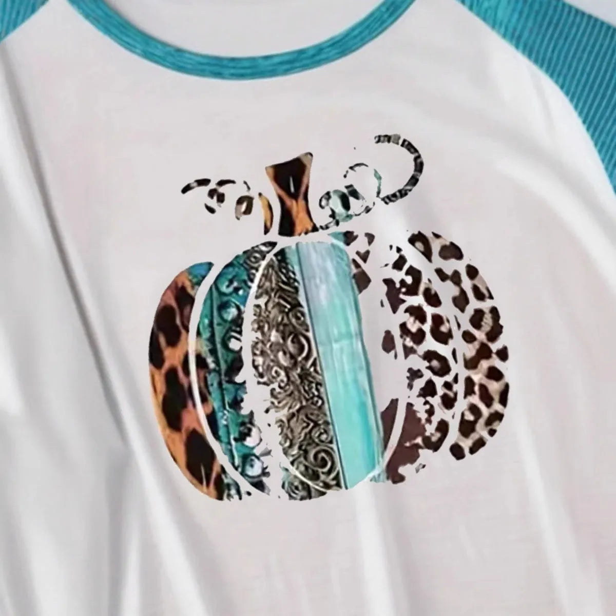 White long sleeve casual T-shirt with a sky blue Halloween pumpkin digital print design.