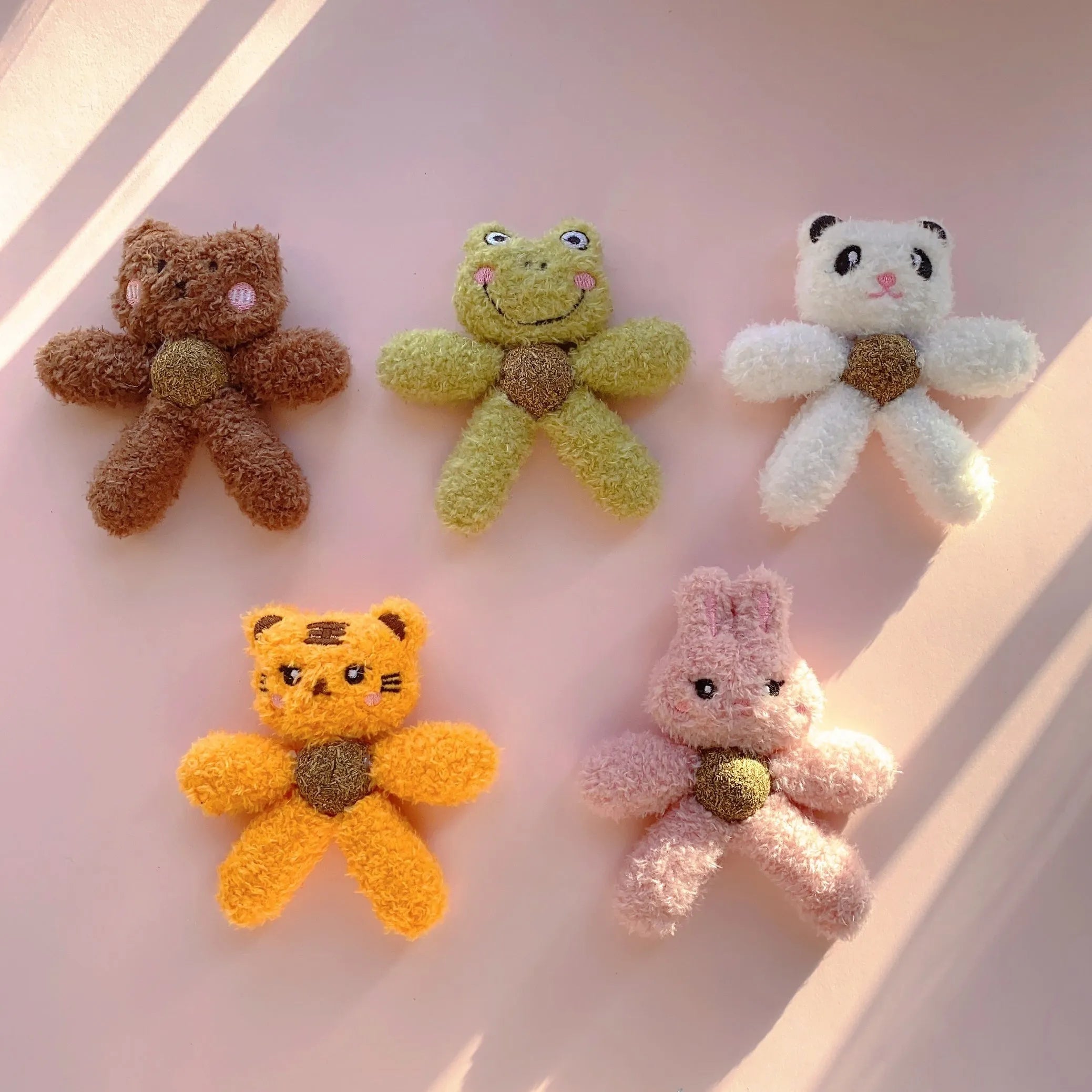 Catnip chewing ball toy in animal designs for dental cleaning and interactive play