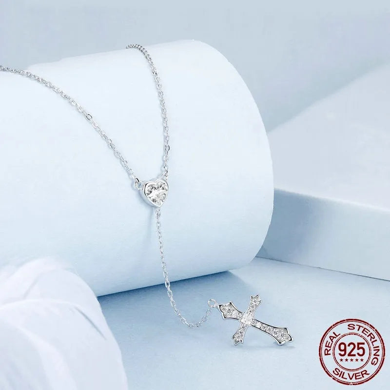 Women's sterling silver V-neck cross necklace on an O-ring chain in BSN384 colour.