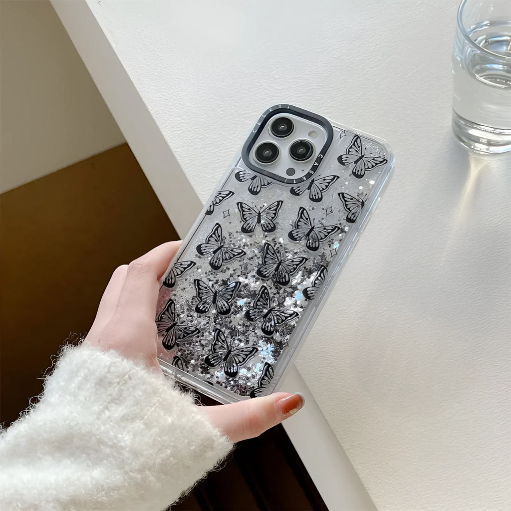 Transparent PC iPhone case with black butterfly cartoon sprayed design and fall prevention function.