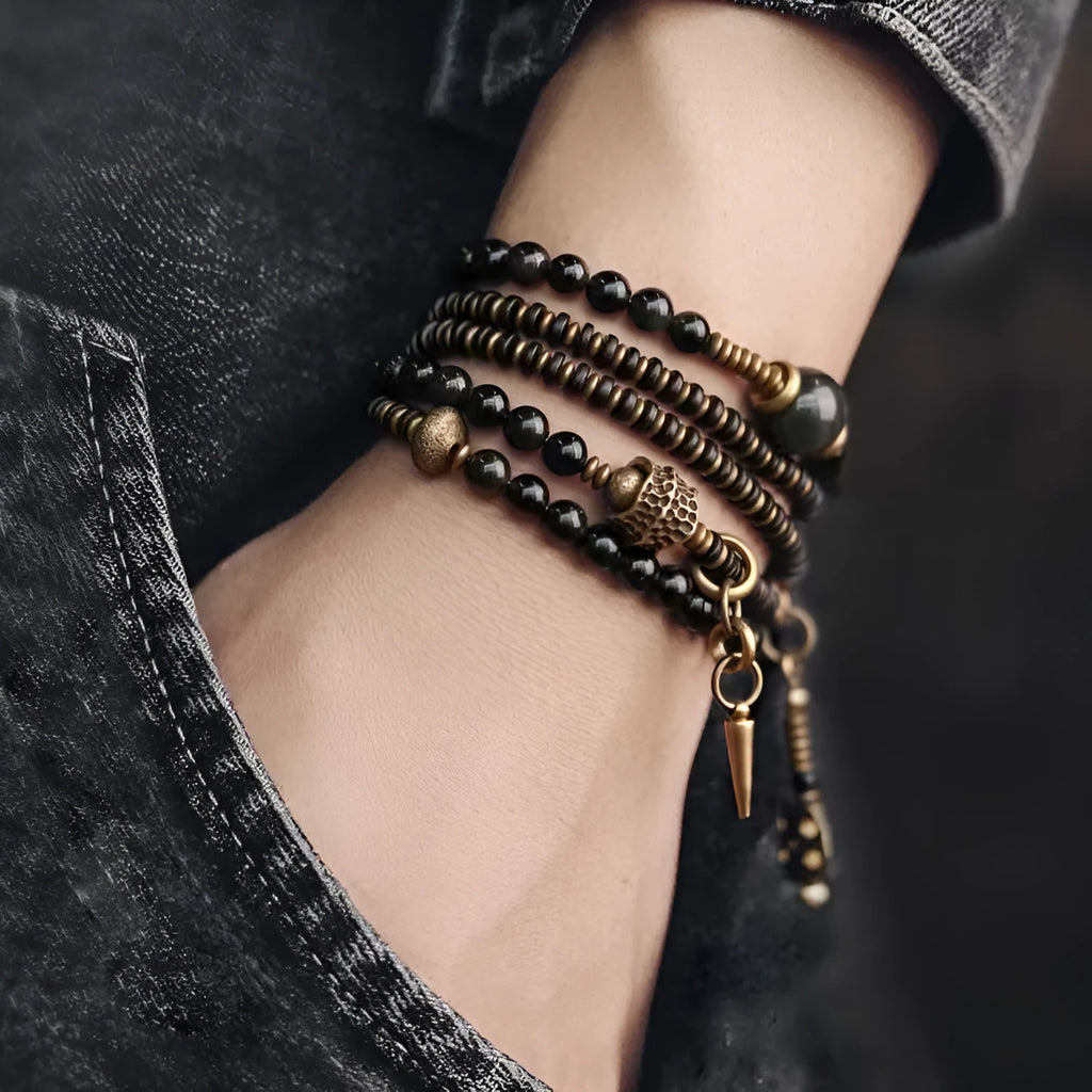 Black retro colourful geometric beaded bracelet with a multi-layered design.