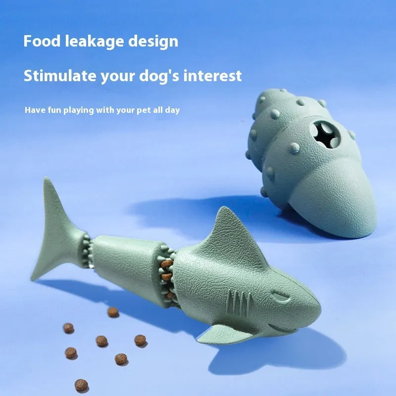 Blue rubber shark dog chew toy on a white background.