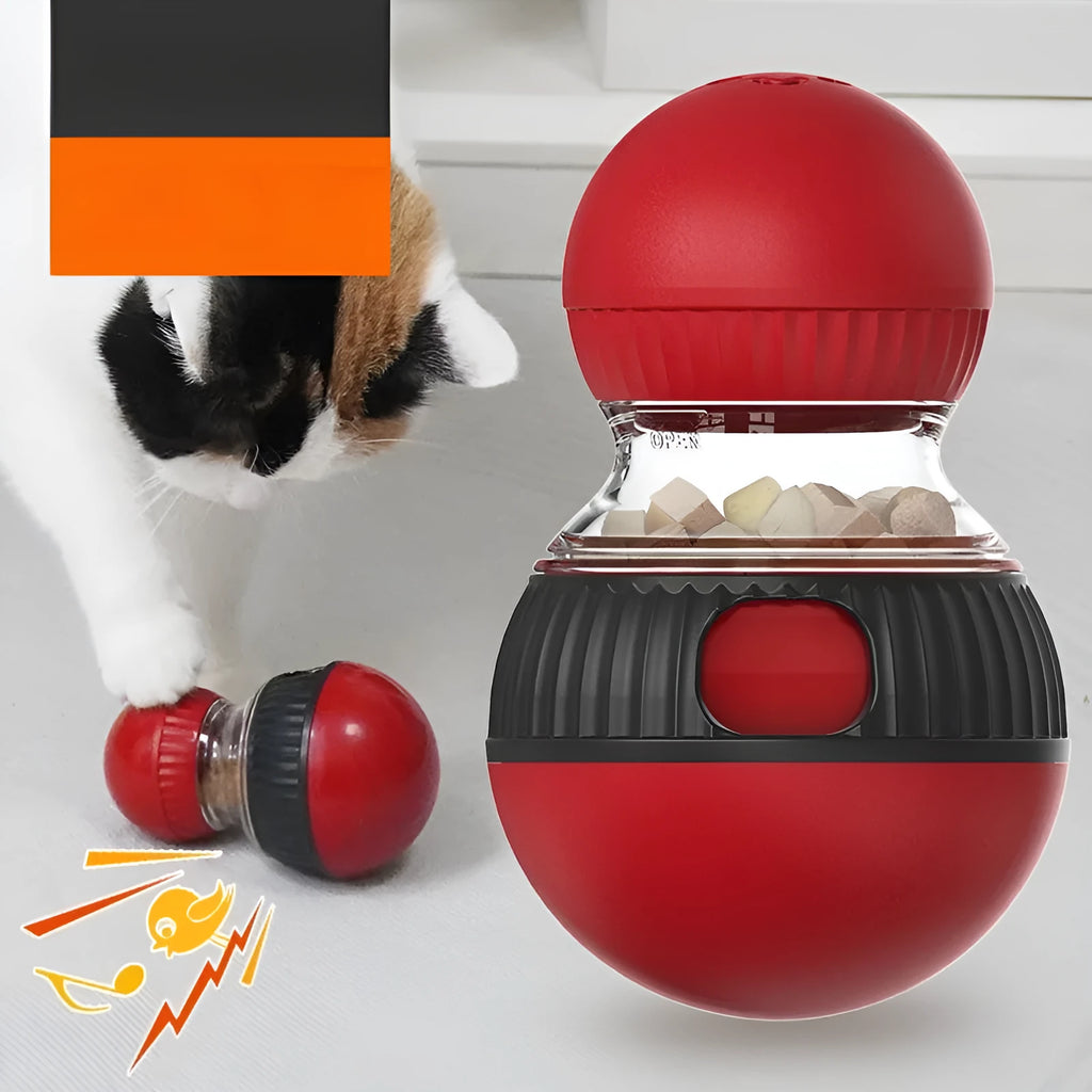Colourful rotating plastic cat toy with a super ball, shown dispensing treats.