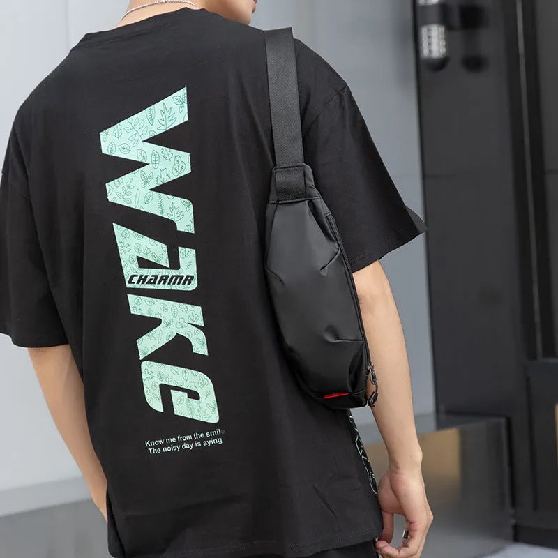 Men's black oxford cloth crossbody waist bag with internal organisation pockets