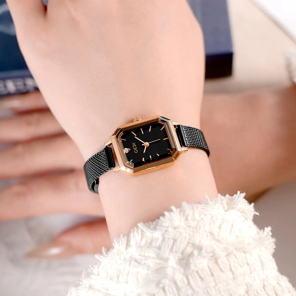 Women's square casual retro watch with rose gold shell and thin 8mm profile on wrist.