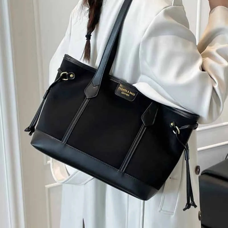 PU shoulder bag in horizontal square shape with double joint straps, slit pocket and sandwich zipper bag