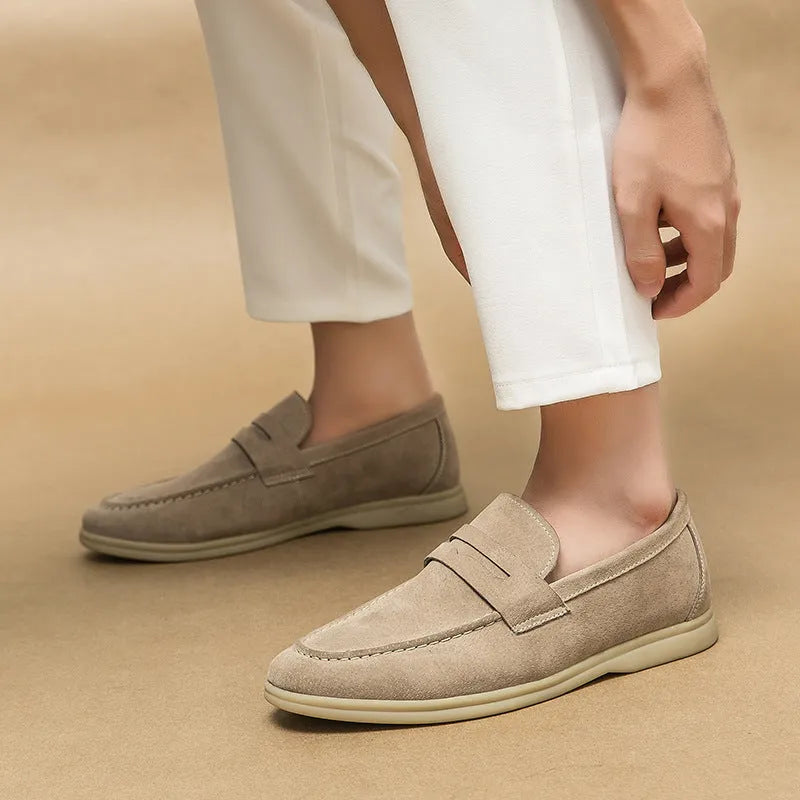 Men's black leather slip-on casual shoes with a round toe and rubber sole