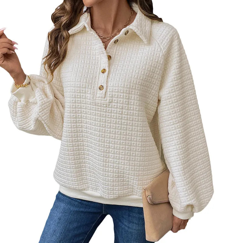 Milky white women's pullover sweater with a polo collar and textured knit fabric