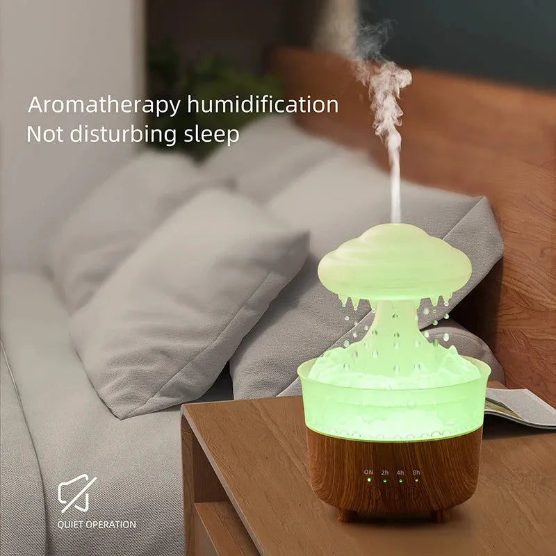 Wood grain white cloud-shaped humidifier diffuser with glowing LED lights and water droplets.