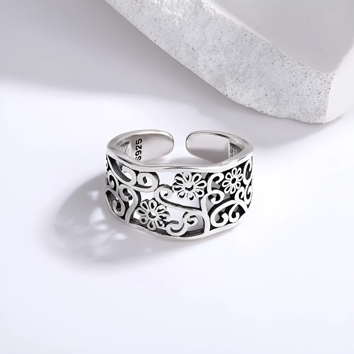 Silver plated open ring with hollow flower design, adjustable opening, retro style, colour retro JZ02137