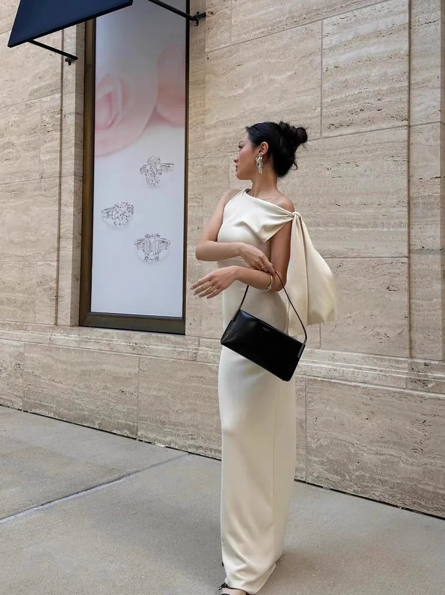 Women's sloping shoulder solid colour white long dress with high waist and crumple polyester finish