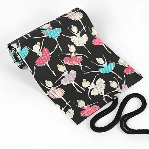 Square canvas rolling pencil case with ballet girl print, unfurled to show multiple pencil slots.