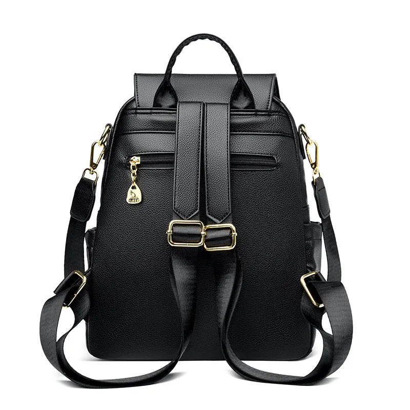 Genuine leather backpack with pendant and spliced belt detail for students and travellers, available in beige