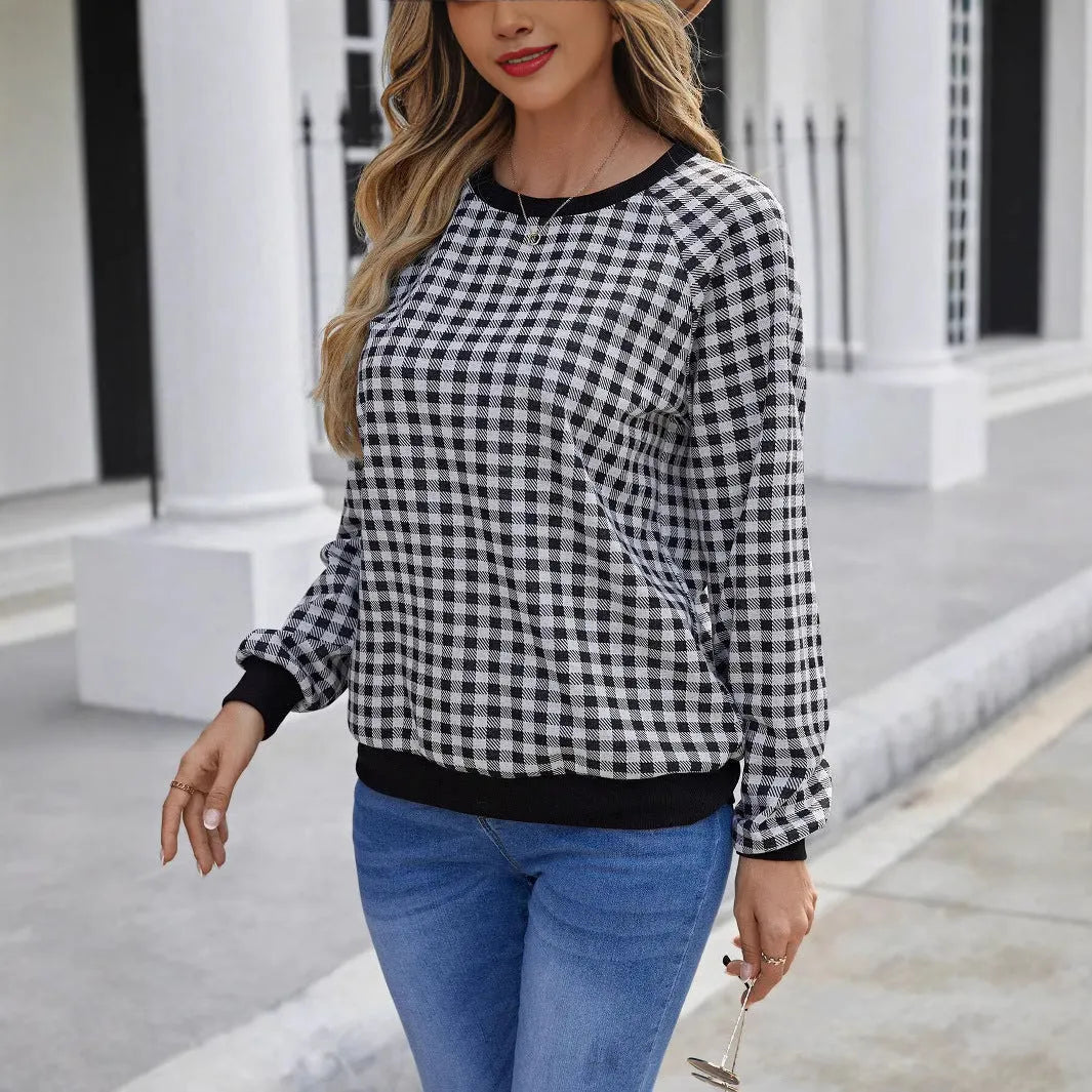 Black long sleeve pullover sweater with a Japanese sweet plaid and striped pattern.
