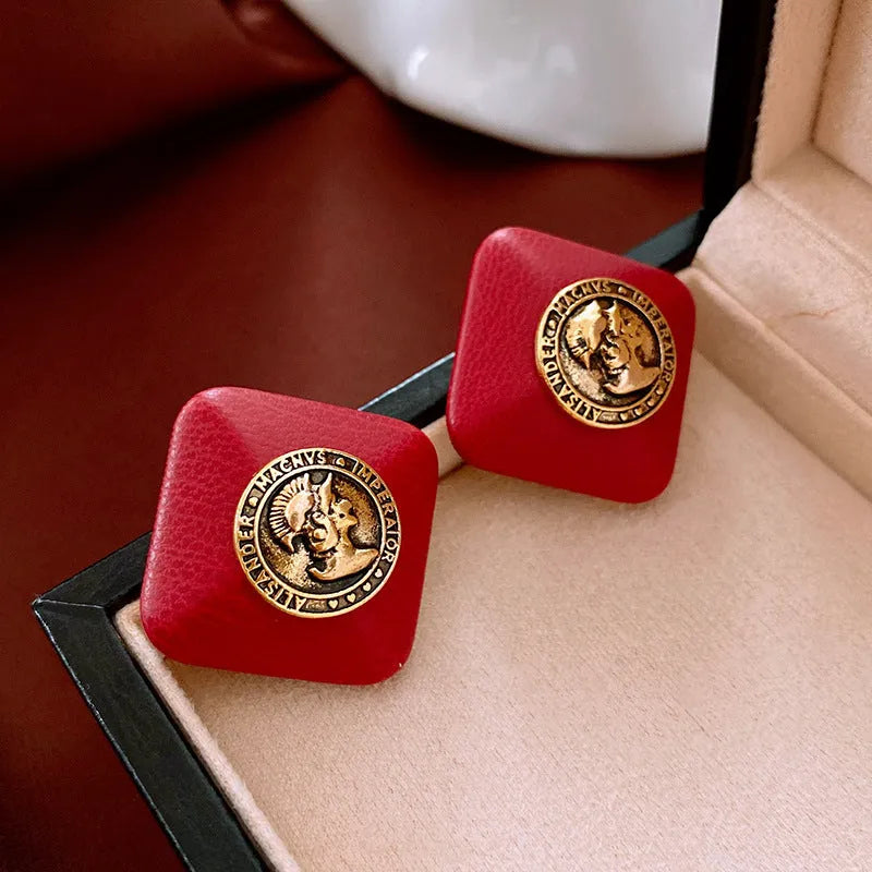 Red diamond-shaped faux leather portrait earrings with silver needle and electroplated alloy, geometric quadrilateral design for women