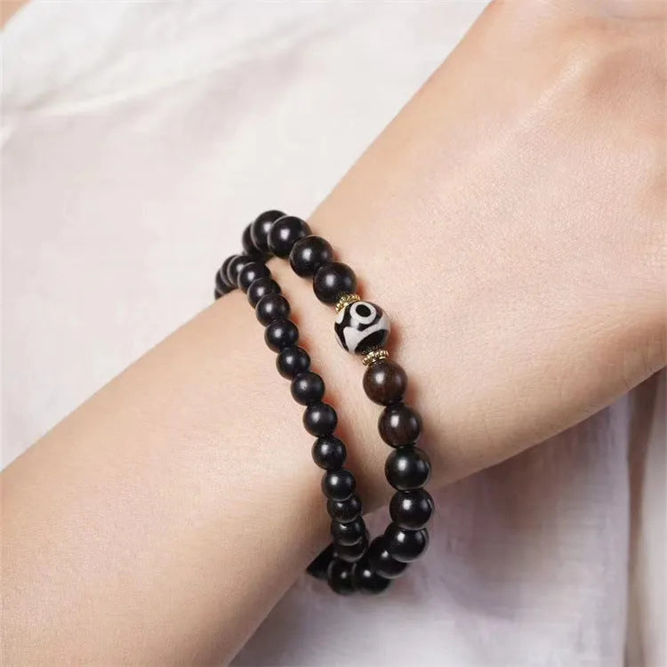 Ebony wood Tibetan prayer bead bracelet with 8mm beads in two-circle design