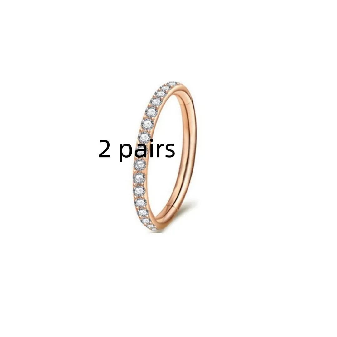 Stainless steel seamless nose ring with diamond detail in gold, rose gold and steel finishes