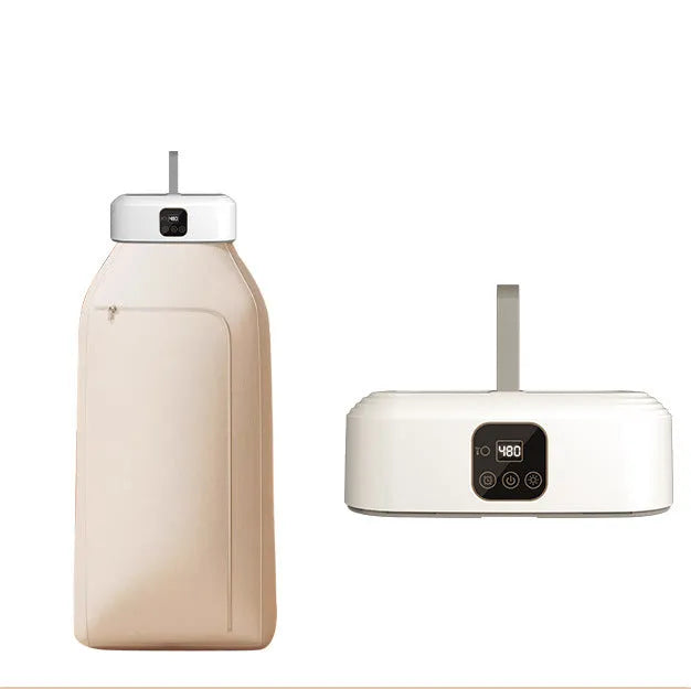 White cylindrical portable clothes dryer with remote control, folded for compact storage