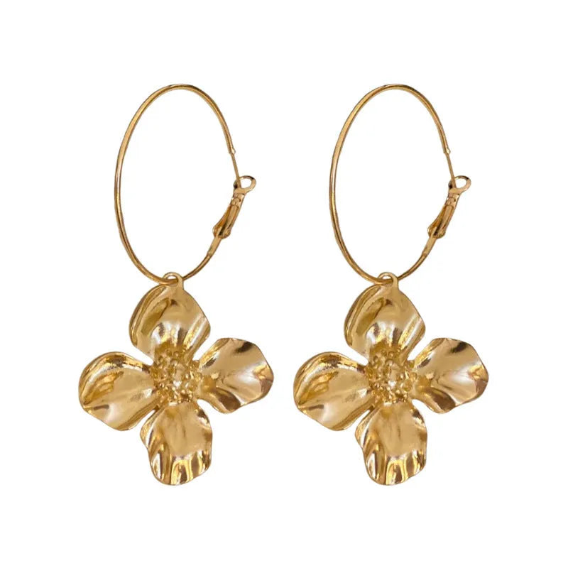 Gold and silver metal earrings with floral geometric design and electroplated finish