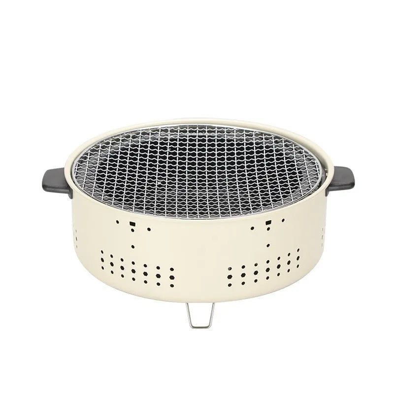 Portable carbon steel charcoal stove with a circular grill rack, for indoor and outdoor cooking.