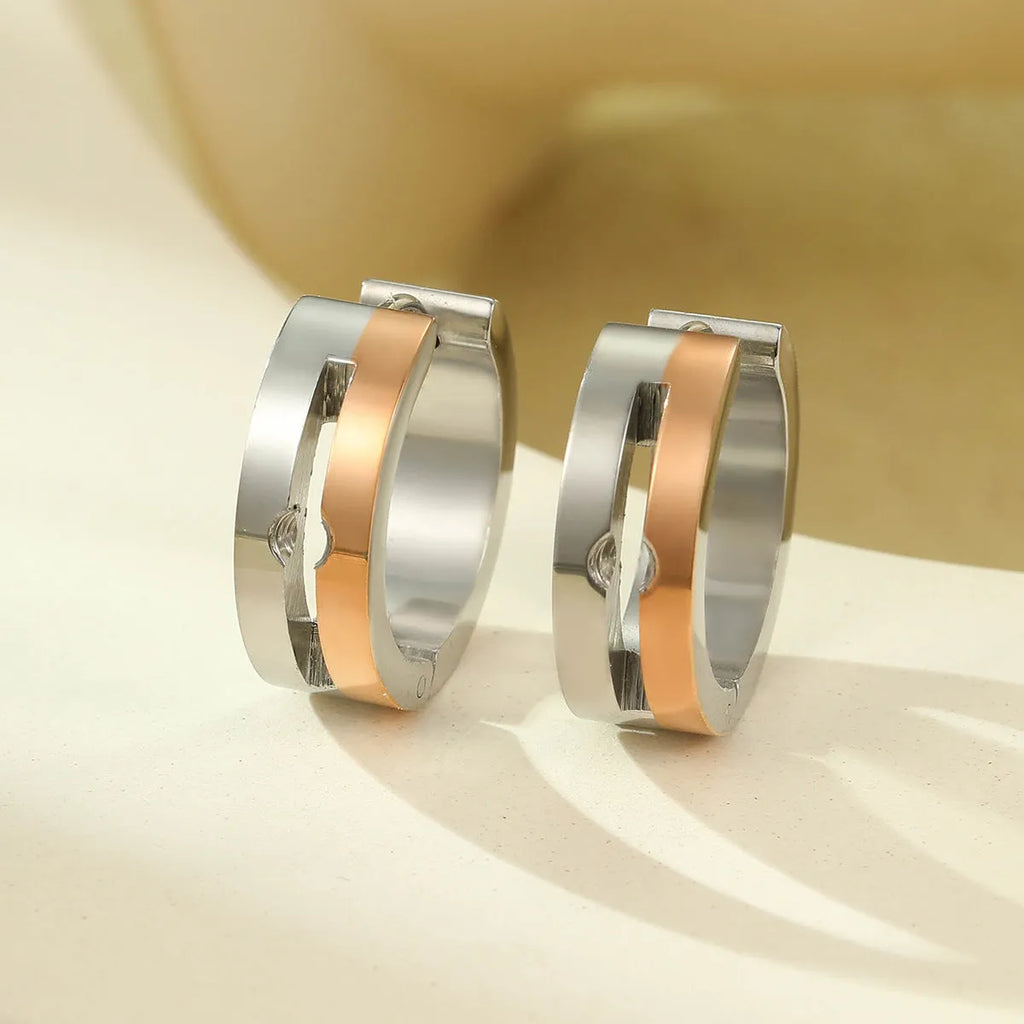 Pair of geometric diamond ear clips in 18K electroplated stainless steel, shown in gold, colour matching, and rose gold options