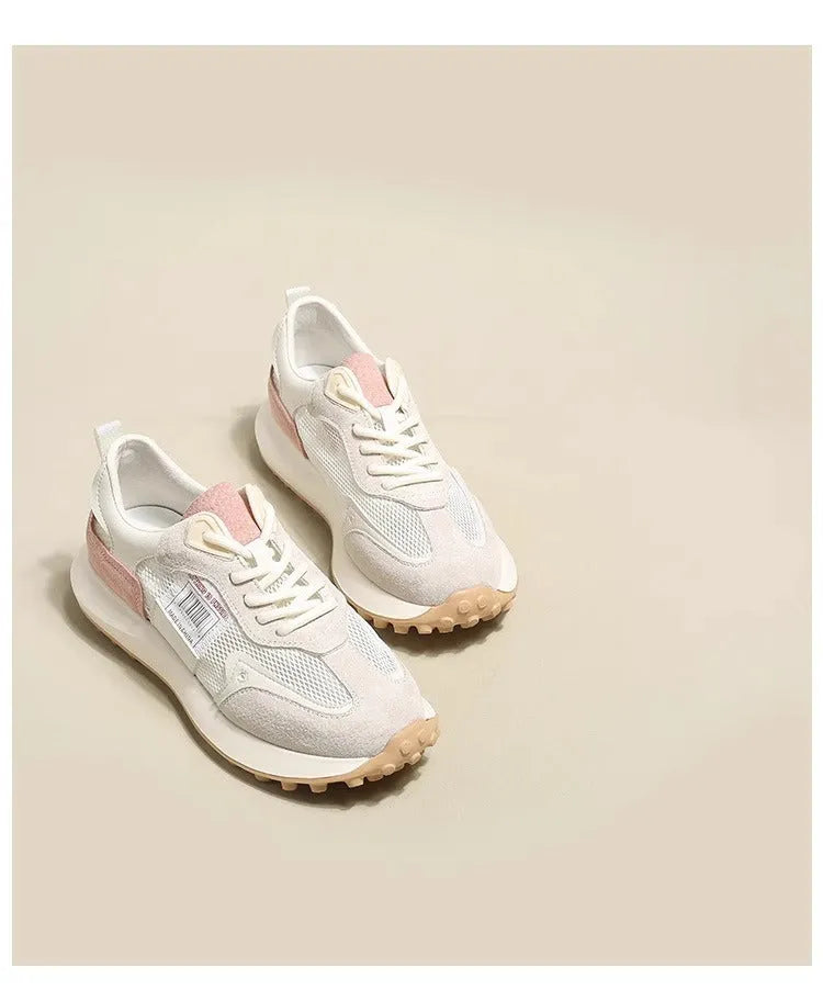 Women's grey and pink retro sneaker with low-top design and flat rubber sole