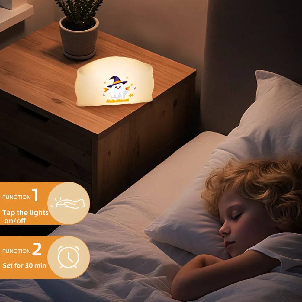 Cartoon ghost doll table lamp with warm white light, showing Magic Ghost and Pumpkin Ghost colour options.
