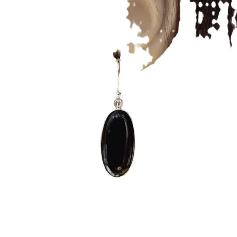 Women's geometric earrings with oval black agate pendant and electroplated silver-coloured finish