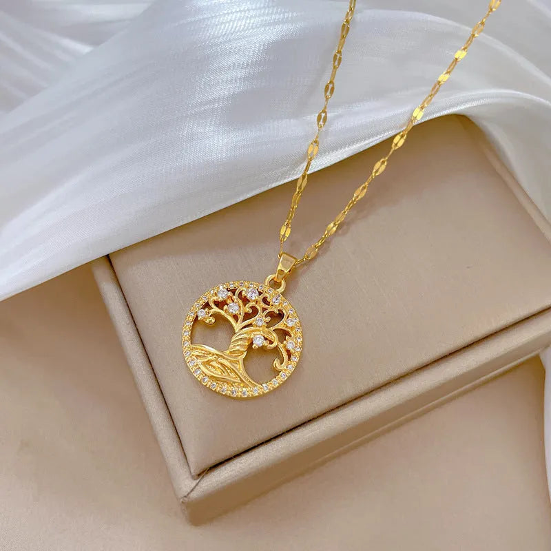 Gold plated adjustable necklace with mother-of-pearl cross pendant set with sparkling zircon stones on a lip chain.