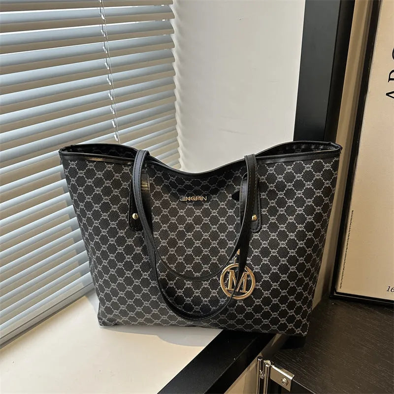 PU leather shoulder bag with sewing thread detail in black, shown with measurements.
