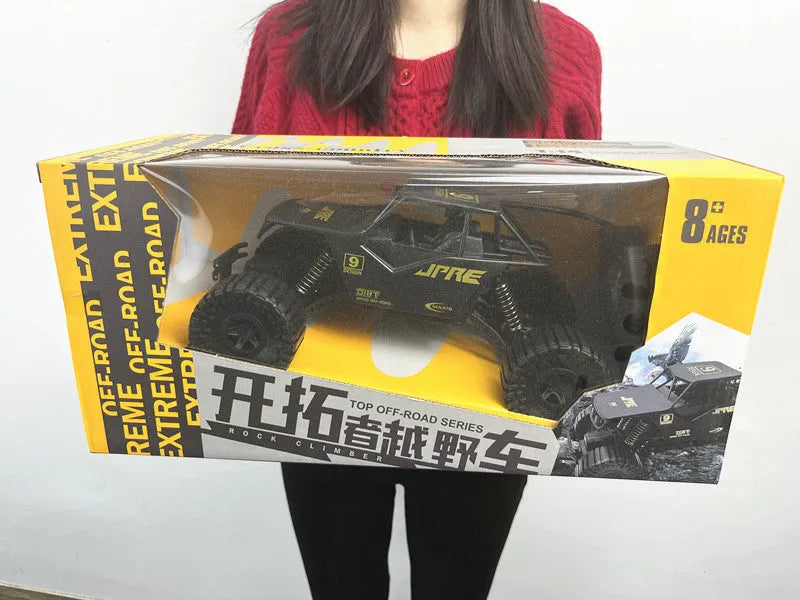 Super large black remote control off-road toy car with four-wheel drive and spring rod suspension