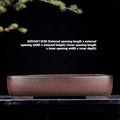 Handmade antique rectangular purple clay flower pot showing its size and shape.