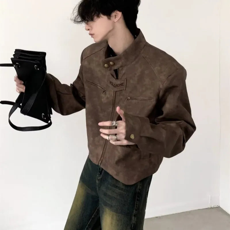 Men's retro brown PU leather short coat with long sleeves and tight fit, shown in casual style.