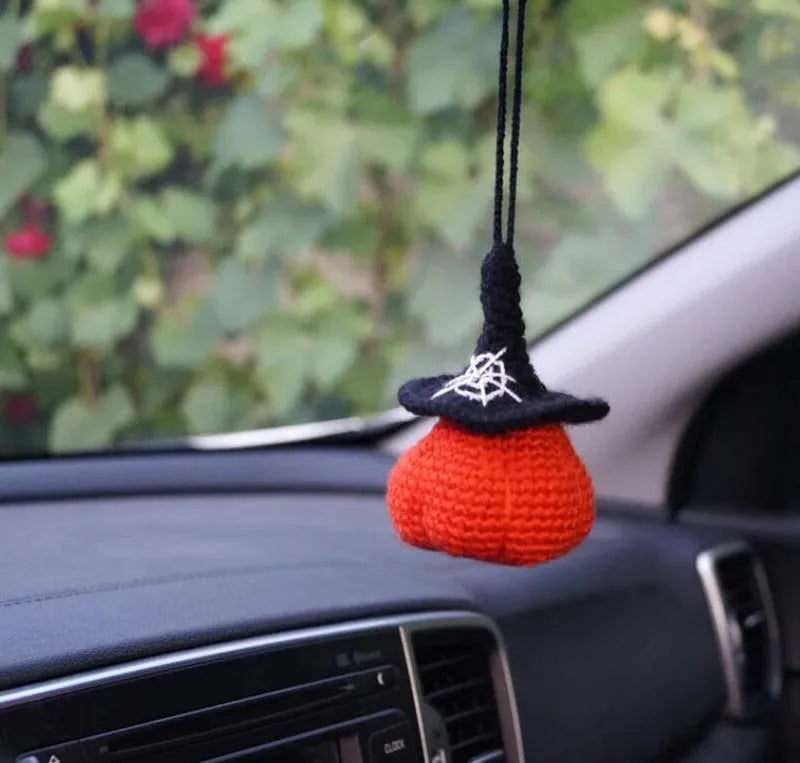 Plush hand-woven car hanging ornament in a cartoon design, made from soft polyester fabric.