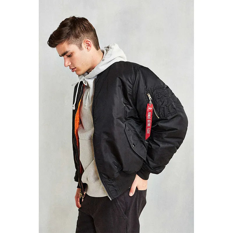 Men's army green cotton-padded pilot jacket with double-sided nylon construction on a hanger.