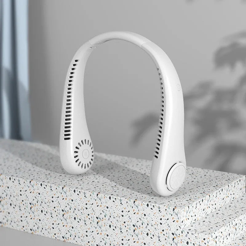Pink bladeless neck-hanging personal fan with USB charging port.