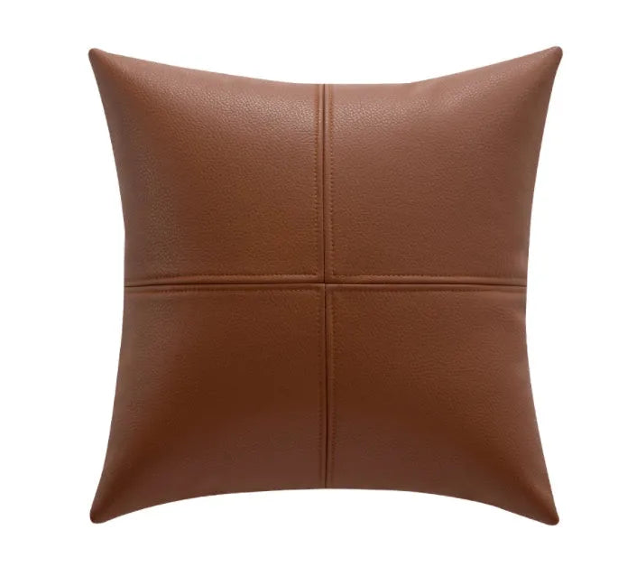 Soft cowhide leather solid colour pillow cover in a neutral shade on a sofa