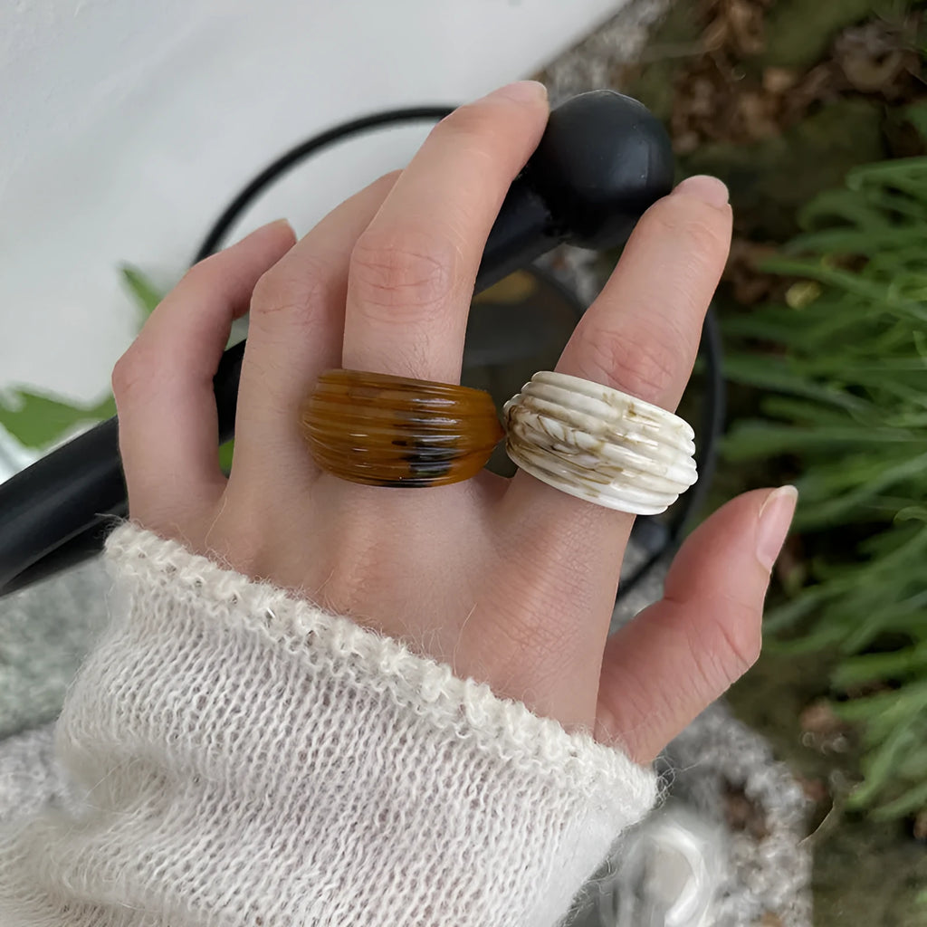 Chinese-style irregular geometric resin ring in brown and white colour options